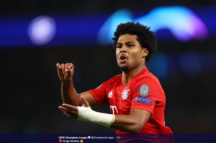 Pemain Bayern Muenchen, Serge Gnabry, melakuan selebrais seusai menjebol gawang Tottenham Hotspur pada Selasa (1/10/2019).