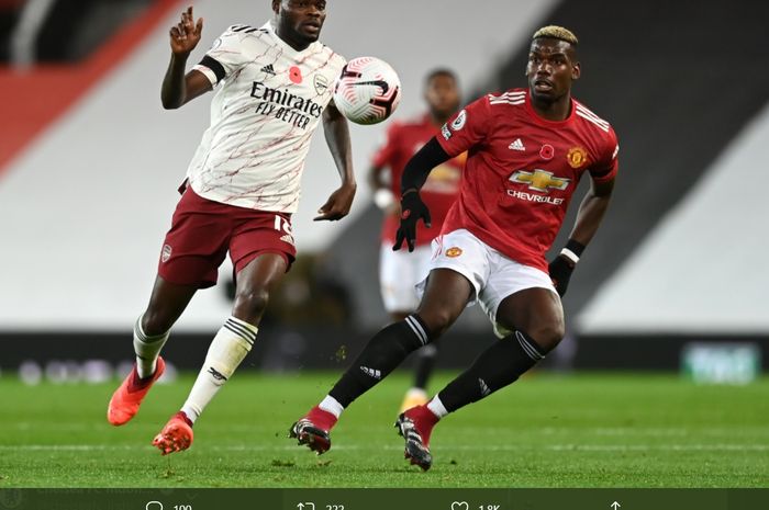 Duel  antara Thomas Partey dan Paul Pogba menghiasid pertandingan antara Manchester United dan Arsenal di Old Trafford, Minggu (1/11/2020).