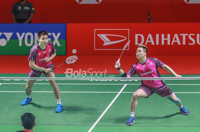 Pasangan ganda putra Malaysia, Soh Wooi Yik/Aaron Chia, saat bertanding di Indonesia Masters 2022.