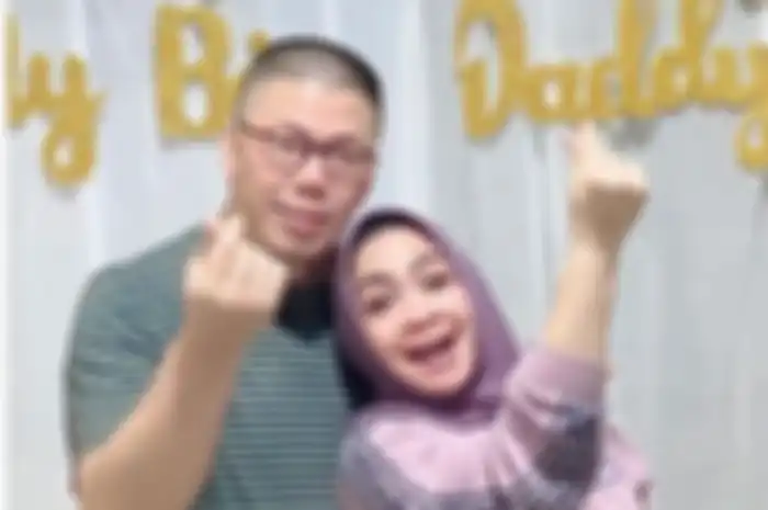 Rieta Amilia dan suami
