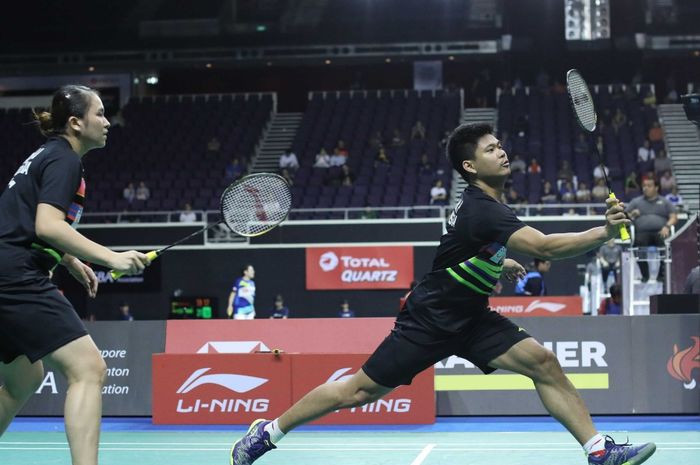 Ganda campuran Indonesia, Praveen Jordan/Melati Daeva Oktavianti, saat bermain pada babak pertama Singapore Open 2019, Rabu (10/4/2019).