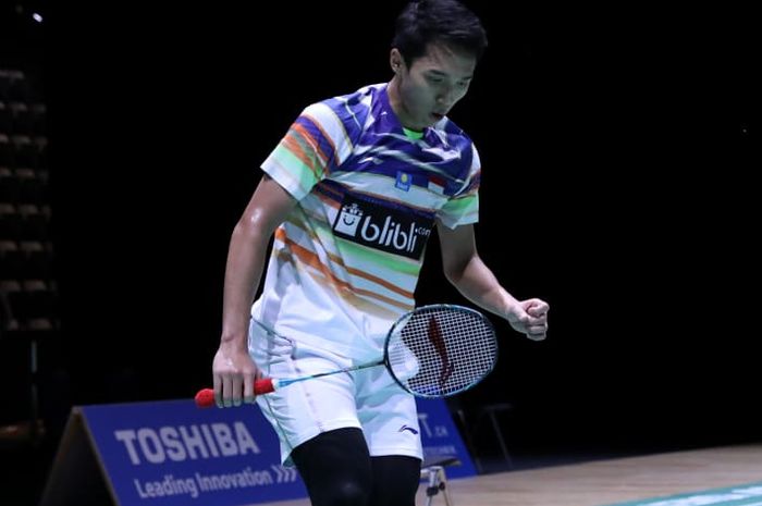 Ekspresi Jonatan Christie saat menjalani laga babak pertama Swiss Open 2019 yang dihelat di Basel pada Rabu (13/3/2019).