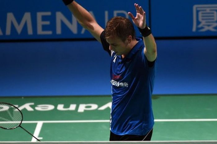 Pebulu tangkis tunggal putra Denmark, Hans-Kristian Vittinghus, melakukan selebrasi setelah memenang