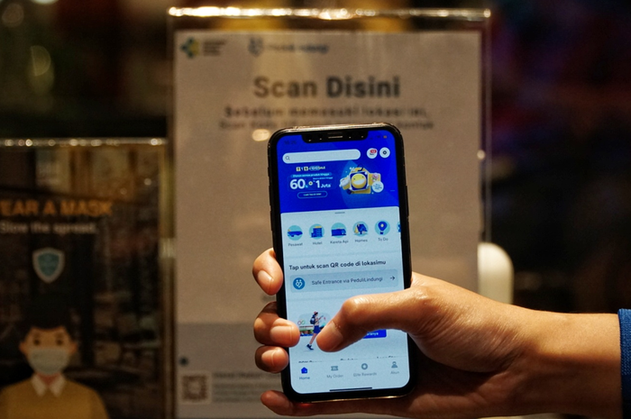Ilustrasi scan PeduliLindungi dengan tiket.com.