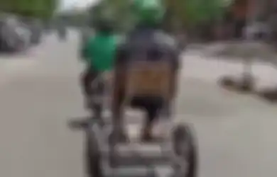 Unik! Begini Jadinya Kalau Ojol Terapin Physical Distancing Sama Penumpang