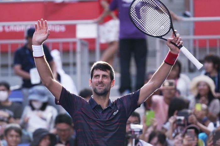 Selebrasi Novak Djokovic, usai menjuarai Japan Open 2019, Minggu (6/10/2019)