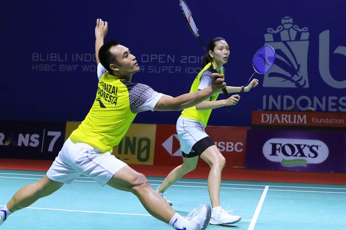 Pasangan ganda campuran Indonesia, Hafiz Faizal/Gloria Emanuelle Widjaja, menjalani laga babak kedua Indonesia Open 2019 di Istora Senayan, Jakarta, Kamis (18/7/2019).