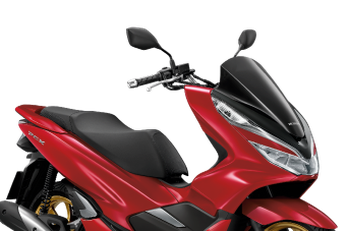 Honda PCX 150 Thailand berwarna merah dan pelek emas.