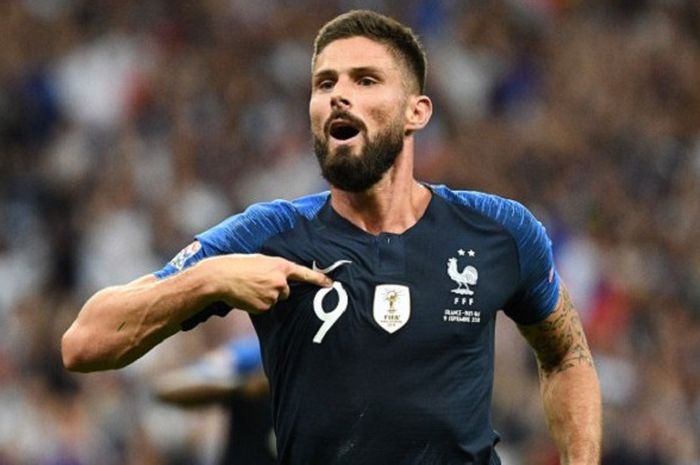 Striker timnas Prancis, Olivier Giroud, bersuka cita usai mencetak gol ke gawang Belanda di League A