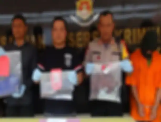 Kapolres Palangkaraya AKBP Timbul RK Siregar saat pengungkapan kasus tewasnya siswa SMP di Palangkaraya, Minggu (1/9/2019).