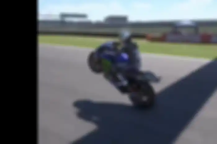 Aksi Maverick Vinales wheelie di atas motor MotoGP meski bukan motor betulan melainkan virtual