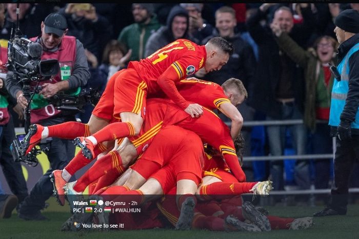 Selebrasi pemain Wales saat memastikan lolos ke putaran final Euro 2020 usai menang 2-0 atas Hungaria di Cardiff City Stadium, Selasa (19/11/2019) atau Rabu dini hari WIB. 