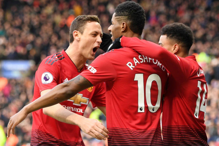 Para pemain Manchester United merayakan gol yang dicetak Marcus Rashford pada laga kontra Leicester City di Stadion King Power, Minggu (3/2/2019).