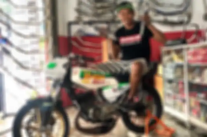 Febrianus &lsquo;Balank&rsquo; Setyawan pembalap yang khas dengan nomor #128