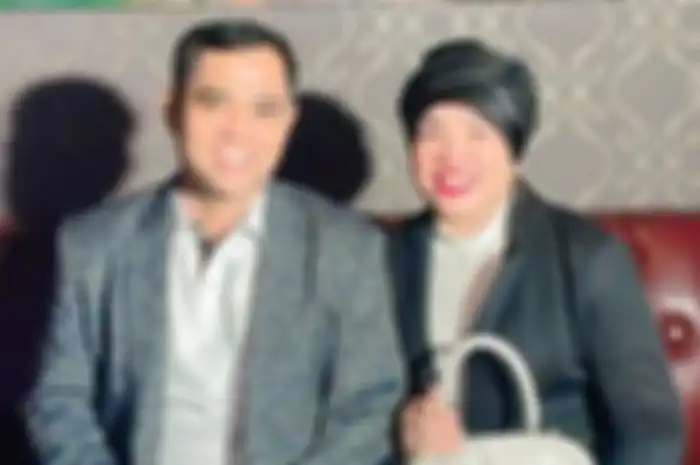 Haji Faisal dan Dewi Zuhriati   