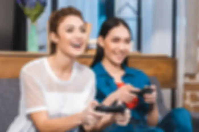 Ilustrasi gamers wanita yang sedang bermain game