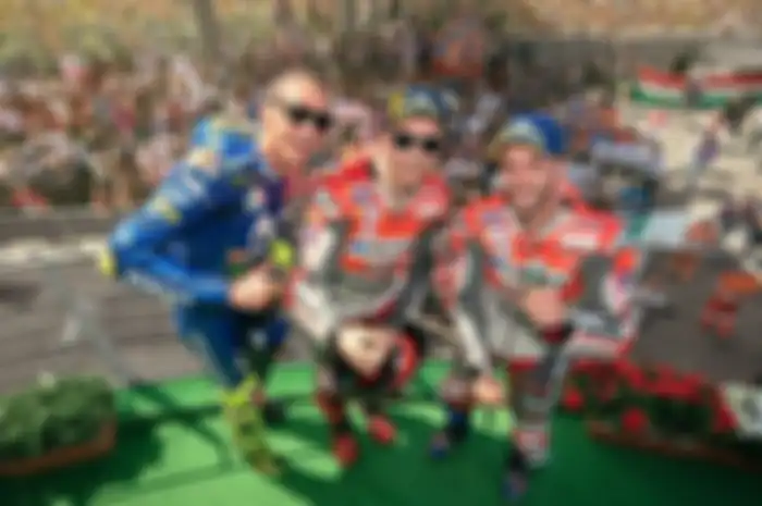 Podium MotoGP Italia 2018, Valentino Rossi (kiri) dan Jorge Lorenzo (tengah) paling banyak menang di Mugello