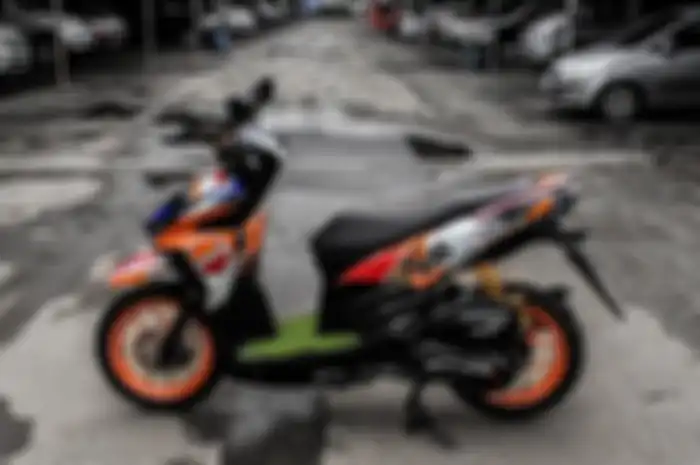 Warna oranye khas RC213V terlihat dari Vario ini
