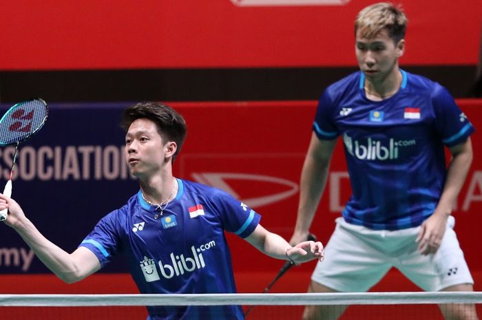 Pasangan ganda putra Indonesia, Marcus Fernaldi Gideon/Kevin Sanjaya Sukamuljo, saat menjalani laga melawan wakil Taiwan, Lin Chia Yu/Yang Ming-Tse, pada babak kesatu Malaysia Masters 2020.