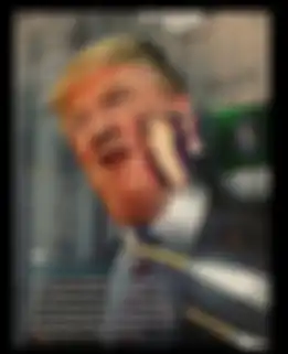 Wajah Donald Trump dipukul tinju oleh Iran.