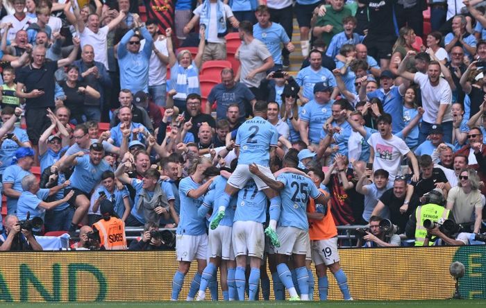 Para pemain Manchester City merayakan gol ke gawang Manchester United pada final Piala FA di Wembley, London (3/6/2023).