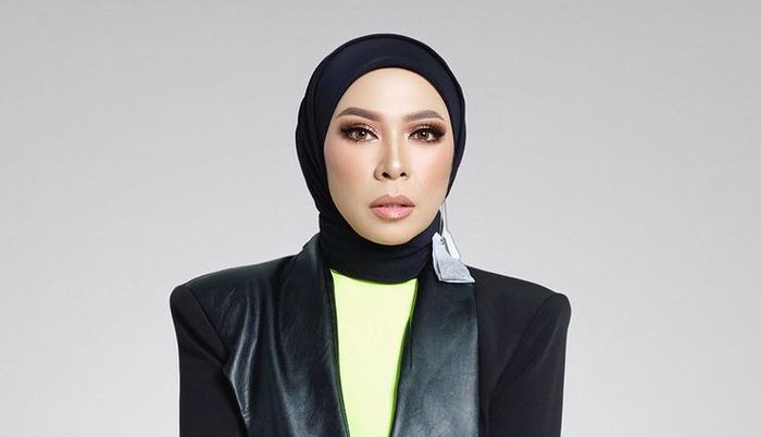 gaya Melly Goeslaw terbaru