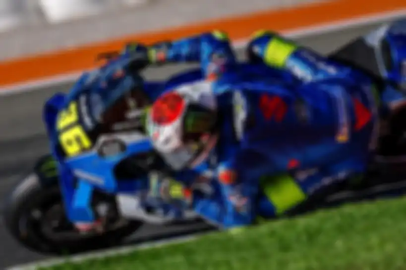 Helm spesial Joan Mir dengan tulisan kanji Jepang yang bermakna terim kasih untuk balapan terakhir MotoGP Valencia 2022