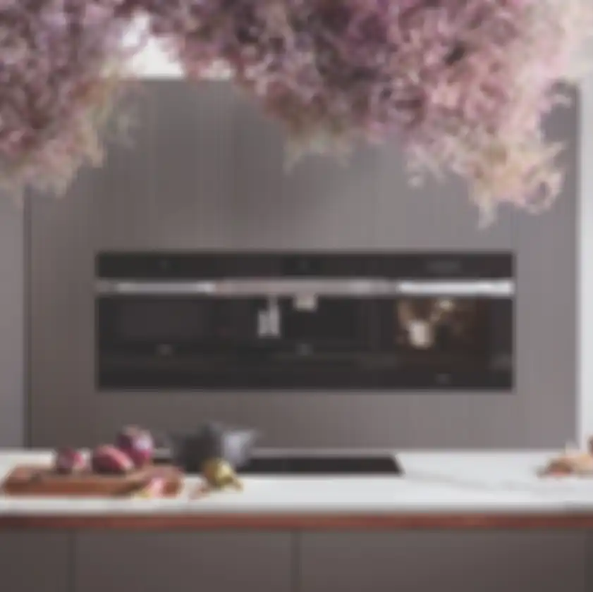 Peranti dapur built-in dengan handle kokoh dari Miele untuk gaya kontemporer.