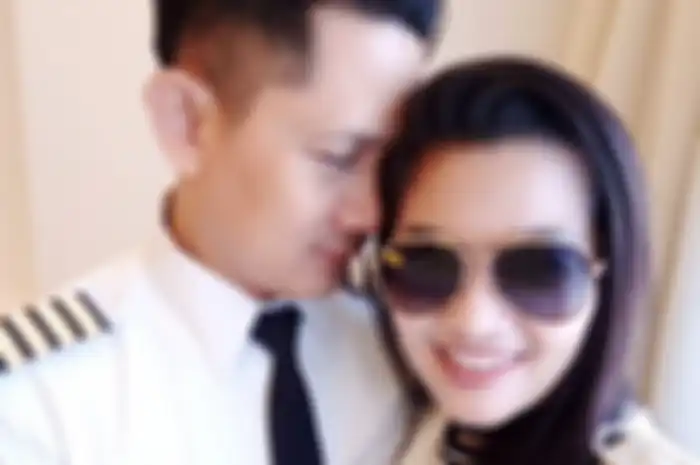 Fitri Carlina dan suami