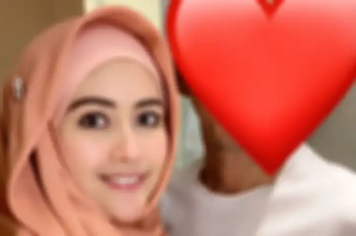 Meggy Wulandari dan suami barunya
