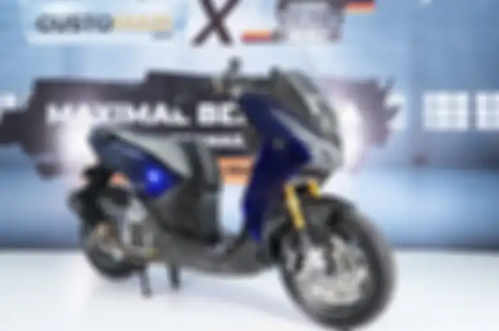 Mewah banget modifikasi motor Yamaha Lexi bergaya racing fashion ini.