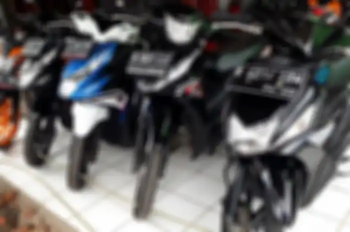 Ilustrasi pedagang motor bekas.