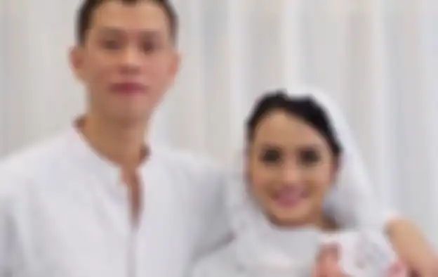 Ririn Ekawati dan mendiang suami