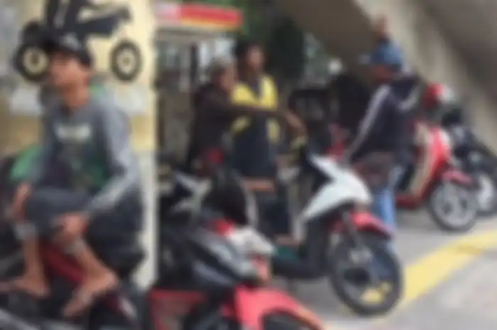 Ilustrasi tukang ojek pangkalan.
