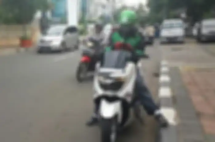 Ilustrasi ojek online.