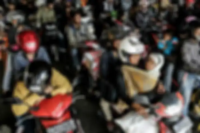 Ilustrasi pemudik yang menggunakan sepeda motor