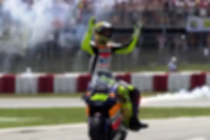 Valentino Rossi saat masih membela tim Repsol Honda.