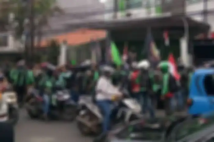 Ilustrasi driver ojek online.