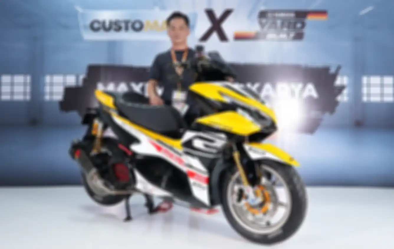 Jemi bersama Yamaha Aerox miliknya