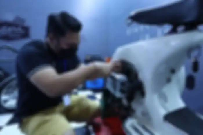 Ilustrasi proses perakitan konversi motor listrik.