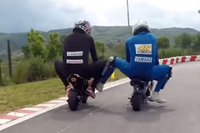 Parodi duel Rossi Vs Marquez dan Lorenzo