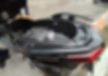 Taruh Laptop Atau HP Di Bagasi Motor, Boleh Atau Tidak? Pabrikan Bilang Gini