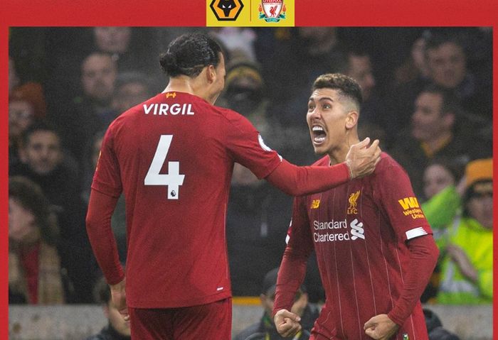 Striker Liverpool, Roberto Firmino, merayakan golnya bersama Virgil van Dijk dalam laga Liga Inggris melawan Wolverhampton Wanderers di Stadion Molineux, Kamis (23/1/2020).