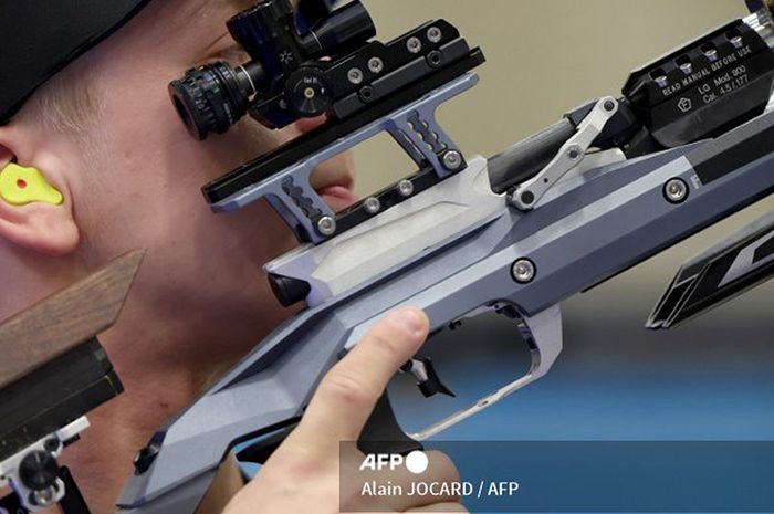 Ilustrasi atlet menembak disiplin air rifle alias senapan angin di Olimpiade Paris 2024.