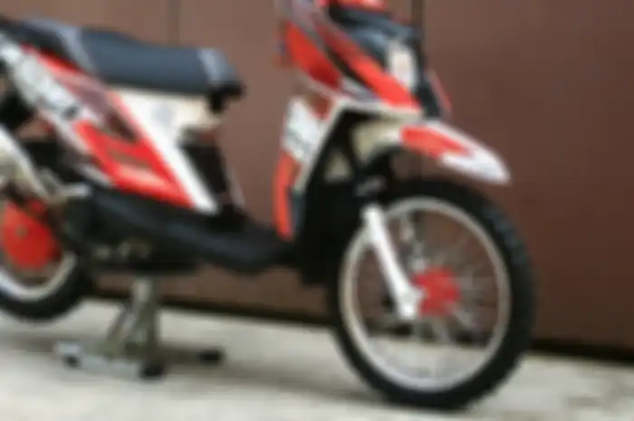 ILUSTRASI. Pengen sokbreker depan motor lebih tinggi, cukup siapkan modal goceng alias Rp 5 ribu aja.