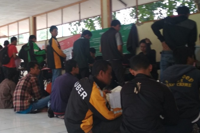 Driver ojek online ex Uber jadi ojek online lain.