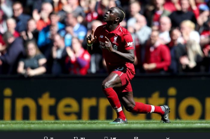 Striker Liverpool, Sadio Mane berselebrasi usai menjebol gawang Wolves dalam laga  pekan ke-38 Liga Inggris di Anfield, Minggu (12/5/2019).