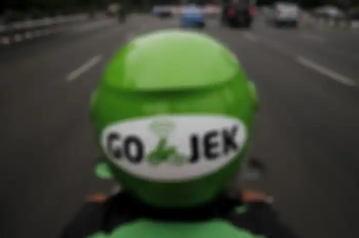 Ilustrasi pengendara ojek online (Gojek)