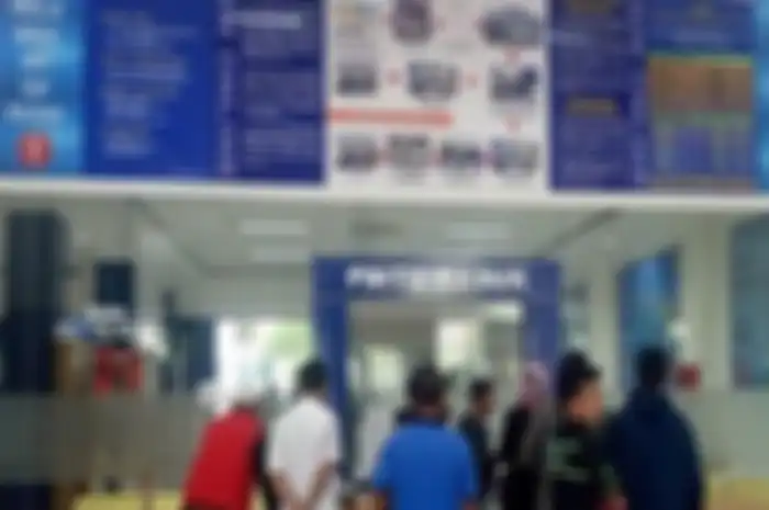 Ilustrasi Kantor Satpas sebagai lokasi pembuatan SIM.