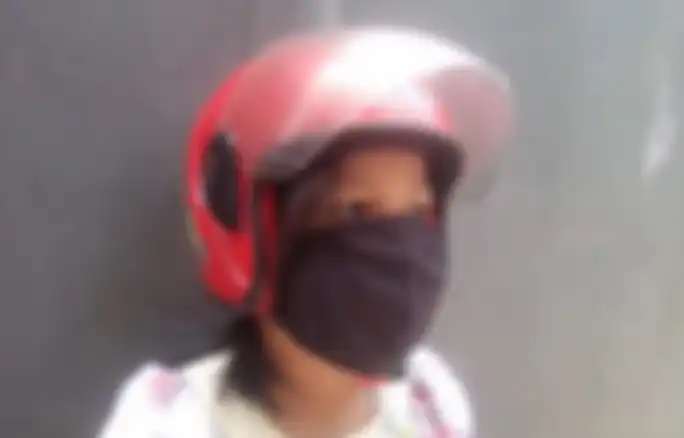 Ilustrasi penggunaan masker ketika riding di masa PPKM.